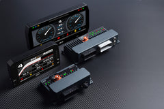 AiM-PDM08-PDM32-and-visors-on-carbonfiber-back-1-scaled-1.jpg
